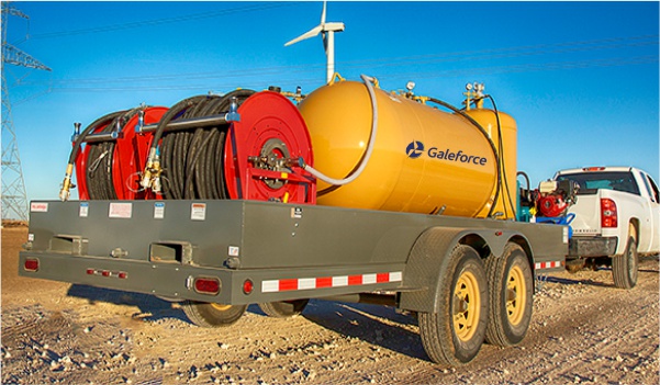 Galeforce Energy performing wind turbine oil change and hydraulic fluid change to maintain gearbox, generator, and hydraulic system efficiency across U.S. turbines.